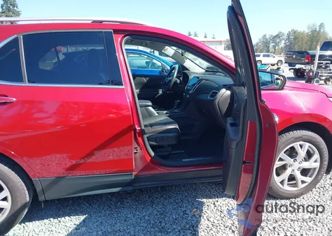 2018 Chevrolet Equinox Premier z USA, uszkodzony, nr VIN 2GNAXVEV4J6134592